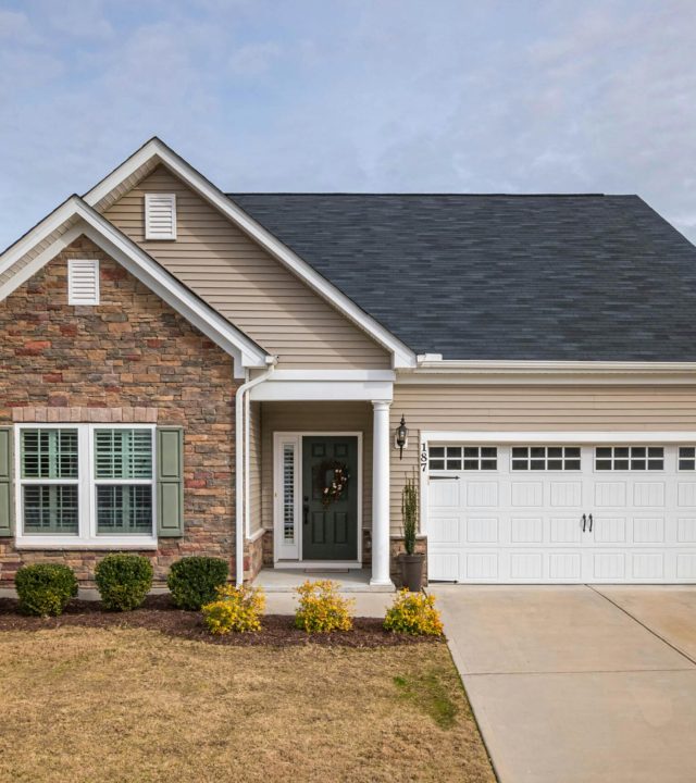 A welcoming suburban family house with a modern facade, perfect for residential living.